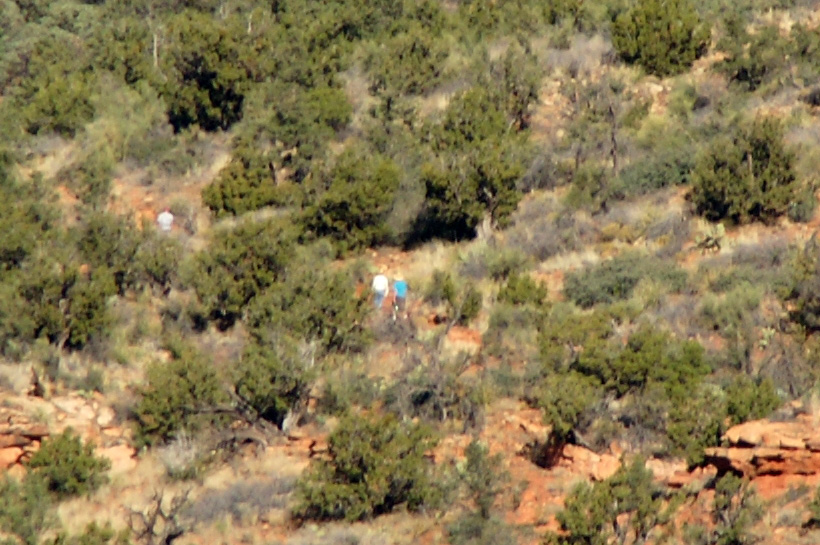 At base of gentle climb in a large alcove / crevice